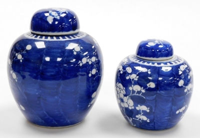 Two Chinese porcelain blue and white ginger jars in prunus pattern, one with four character Kangxi mark to base, 20cm high and 15cm high. - 4