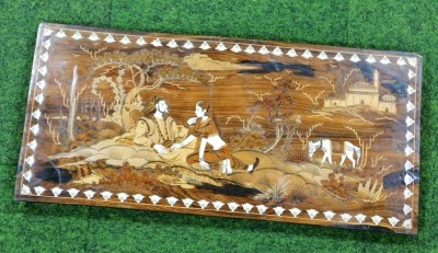 A 20thC Indian inlaid wooden panel, depicting lady and gentleman seated with horse and palace in background, 37cm x 79cm. - 2