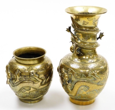 A 20thC polished brass Chinese vase, with raised dragon decoration, 25cm high, and a further smaller example, 14cm high. - 2