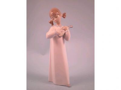 A Lladro figure of a young girl playing a flute or mandolin