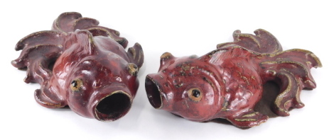 A pair of Chinese Canton stoneware glazed wall vases, formed as shubunkin with open mouths, 24cm long. (AF)