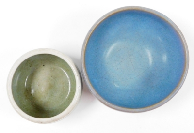 Two celadon glaze bowls, one in green, and one in blue with orange peel underside, 9cm and 13cm diameter. - 2