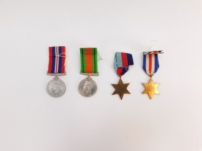 A set of WWII medals, comprising 1939-1945 Star, Defence Medal, France & Germany Star, each blank, in a OHMS box for Mr J J Hall, with ribbons. - 2