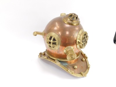 A Siebe Gorman reproduction copper and brass diver's helmet, 42cm high. - 2