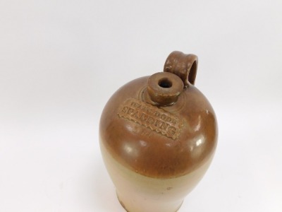 A 19thC stoneware bottle, with raised tablet for Isaac Dods of Spalding, 40cm high. - 2