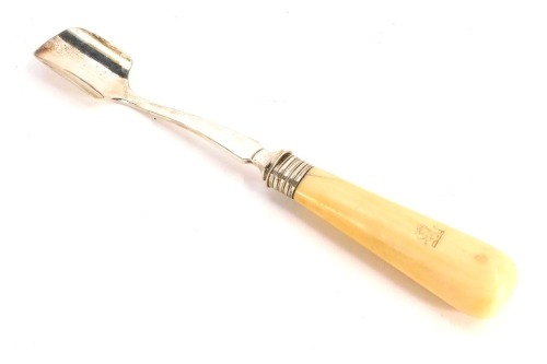 A late Victorian electroplated Stilton cheese scoop, with crested ivory handle, 24cm long.