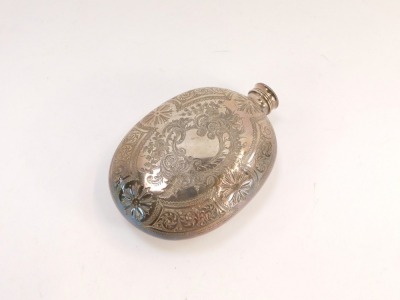 A 20thC silver plated hip flask, with foliate scroll decoration and central shield inscribe W Stephenson January 15th 1901, white metal unmarked, with screw in top, 14cm high. - 2