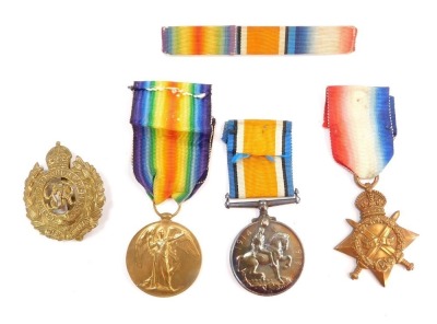 A WWI medal trio, comprising 1914-15 Star, Great War and victory Medals, named to Spr A W Goodsell, Royal Engineers, together with a ribbon bar and a cap badge. (5)