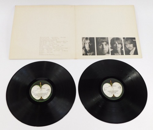 The Beatles White Album, No 0114367, produced by EMI Records, dated 1968.