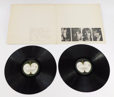 The Beatles White Album, No 0114367, produced by EMI Records, dated 1968.