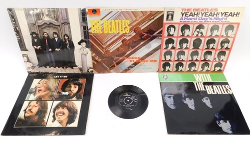 The Beatles, a group of records, comprising Parlophone Please Please Me, Hey Jude, A Hard Day's Night, Let It Be, With The Beatles, and a 45rpm I Want To Hold Your Hand, lacking sleeve. (6)