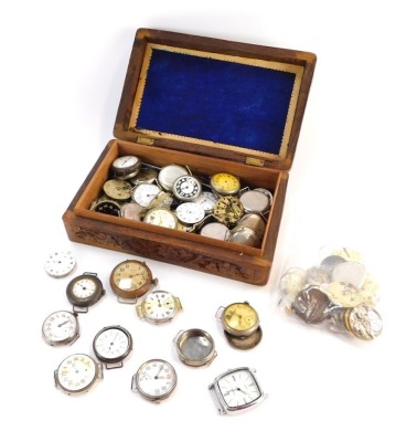 Early 20thC wristwatches, some silver cased, together with movements, winders, dials, etc, in an Indian carved hardwood box. (a quantity)