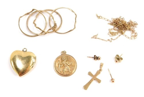 A group of 9ct gold jewellery and jewellery parts, comprising stud earrings, neck chain (AF), St Christopher's pendant, interlinked rings, yellow metal unmarked, part chains, crucifix and a plated locket, 10.3g all in.