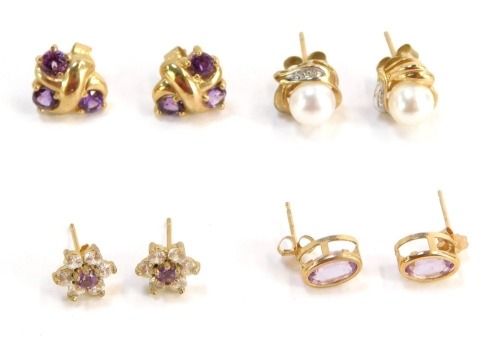 Four pairs of 9ct gold and other earrings, comprising a pair of 9ct gold pearl and CZ studs, a pair of 9ct gold pink stone set studs and two further pairs of clusters, each yellow metal unmarked, 6.8g all in.