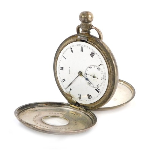 A George V silver pocket watch, the silver half hunter case with glass panel centre and blue enamel Roman numeric dial, opening to reveal inscription 'In Affection Remembrance of Auntie Bessie', serial no 1462070, with white enamel dial marked Rolex, the