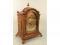 An early 20thC oak mantel clock