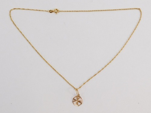 A 9ct gold pendant and chain, the star set pendant on a fine link neck chain, 40cm long, 1.2g.