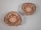 A pair of small embossed and pierced bon bon dishes