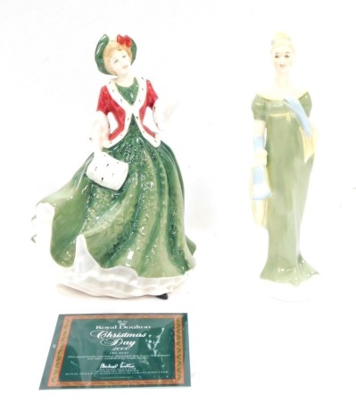 Two Royal Doulton figures, comprising Christmas Day 2000, boxed with certificate, 21cm high, and Lorna, HN2311, 21cm high.