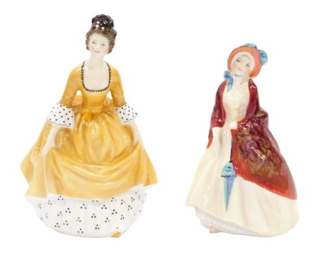 Two Royal Doulton figures, comprising Paisley Shawl HN1988, 15cm high, and Coralie HN2307, 18cm high.