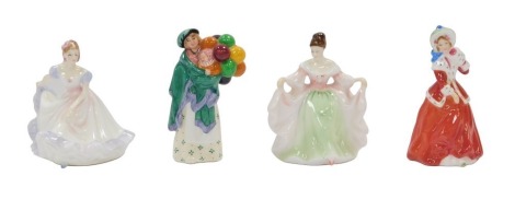 A group of Royal Doulton miniature figures, comprising Christmas Morn HN3212, The Balloon Seller HN2130, Sarah HN3219, and Ninette HN3215. (4)