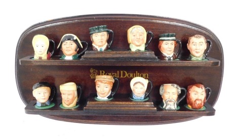 A group of Royal Doulton miniature figures, comprising Oliver Twist, Charles Dickens, Artful Dodger, David Copperfield, Fagin, Betsy Trotwood, Uriah Heep, Scrooge, Mr Bumble, Mrs Bardell, Little Nell and Bill Sykes, together with a Royal Doulton mounted w