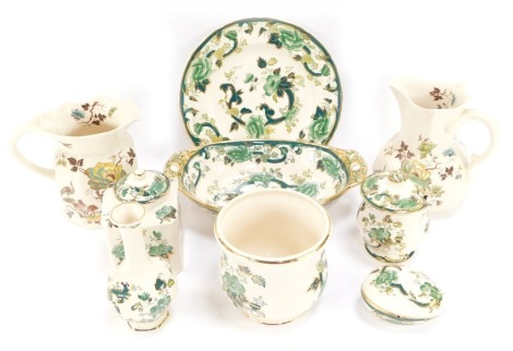 A group of Masons Ironstone china, comprising two Formosa graduated jugs, and a selection of Chartreuse green pattern wares, comprising jar and cover, egg trinket dish, vase, bowl, wall plate, condiment jar and cover, and a planter. (a quantity)