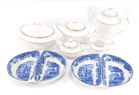 A Spode Opera Platinum pattern part dinner service, comprising sugar bowl, milk jug, teapot, coffee pot and serving tureen, together with two blue and white Spode Italian pattern oven to tableware serving trays. (a quantity)