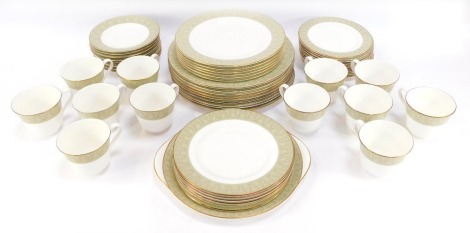 A Royal Doulton part tea and dinner service in the Sonnet pattern, comprising cake plate, nine dinner plates, six medium plates, six small plates, twelve side plates, twelve cups and saucers.