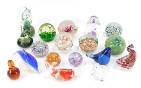 A group of paperweights, comprising a Caithness swirl paperweight, millefiori type paperweight, glass animal paperweights, etc. (a quantity)