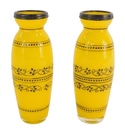 A pair of Victorian yellow glass painted jars, each with a white metal collar, unmarked, 17cm high.