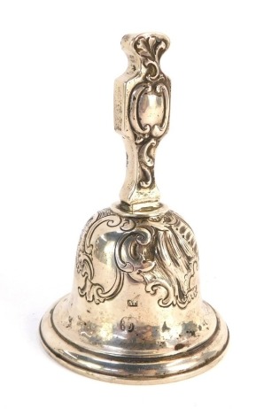 An Austro Hungarian bell, with scroll detail, white metal, rubbed marks, 10.5cm high, 3oz gross.