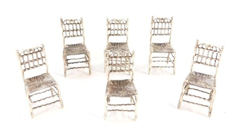 Six white metal miniature doll house chairs, white metal each stamped 925, 6cm high, 3¾oz.