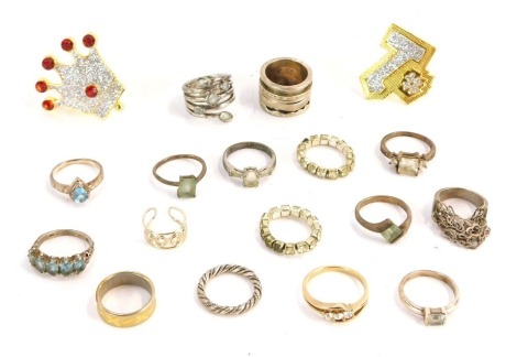 A group of dress rings, comprising three silver dress rings, various other rings (unmarked), plated examples, etc. (a quantity)