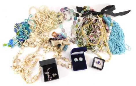 A group of modern costume jewellery, beaded necklaces, multi strand necklaces, etc. (a quantity)