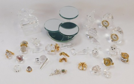 A group of Swarovski crystal and other animals and figures, comprising cat, grand piano, clock, rocking horse, etc. (a quantity, AF)