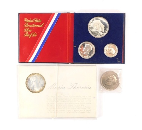 A George VI crown 1951, United States bicentennial silver proof set 1976 and a Maria Theresa thaler.