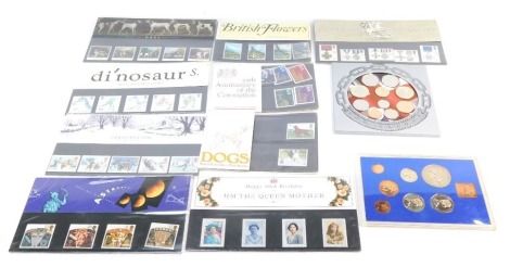 Coins and first day covers, comprising a Royal Mint For Valour coin set for 2006, and a 1977 coin set, together with first day covers for HM The Queen Mother, Dogs, Dinosaurs, British Flowers, Coronation, Gallantry, Christmas 1890, and Astronomy. (a quant