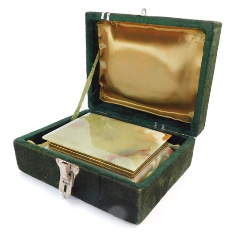 An onyx jewellery box, in green and cream, with brass trim, 17cm wide, 13cm deep, in presentation box.