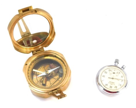 A brass compass and a Sekonda 16 jewel stop watch. (2)