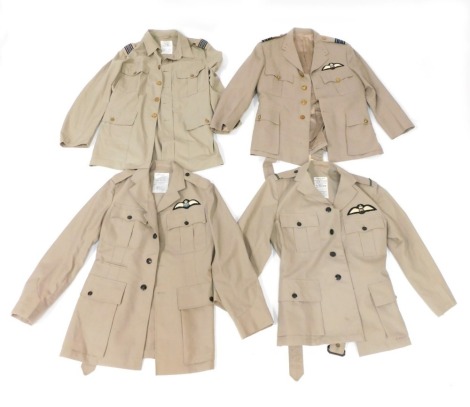 Four Air Force khaki jackets, comprising two Squadron Leader's No 6 jackets, RAAF Warrant Officer's No 6 jacket, and a Pilot Officer's No 6 jacket. (4)