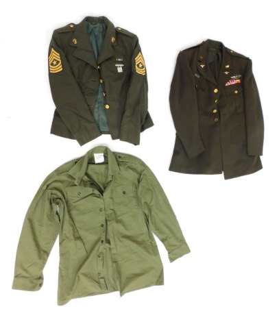 Two US Army dress jackets, one for a Sergeant Major Rifle Marksmen, with shirt, and a US Army officer's dress jacket. (3)