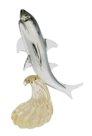 A Murano glass dolphin, riding a wave, 35cm high.