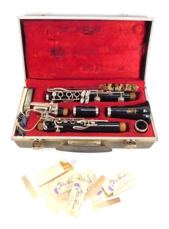 A Boosey & Hawkes Regent clarinet, with accessories, cased.