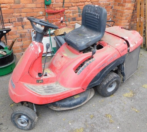 A Honda Hydrostatic control ride-on mower, model 2800SH, in red.