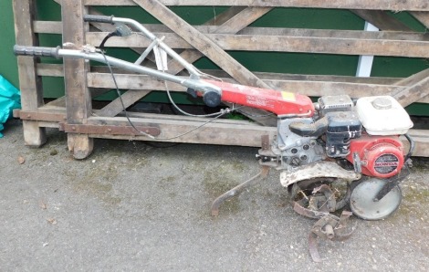 A Honda F380 petrol cultivator.