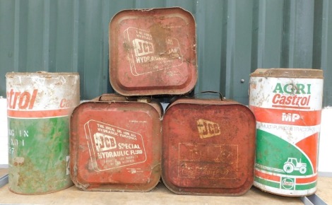 Five oil drums, comprising two Agricastrol Tractor oil drums, and three JCB Hydrochloric oil barrels. (5)