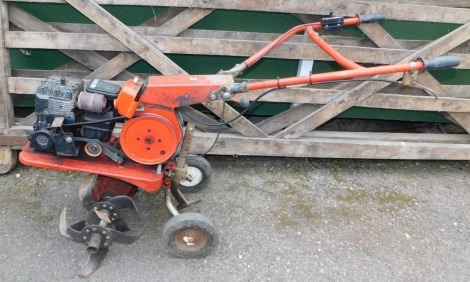 A Briggs & Stratton petrol cultivator, 4hp, 188cc.