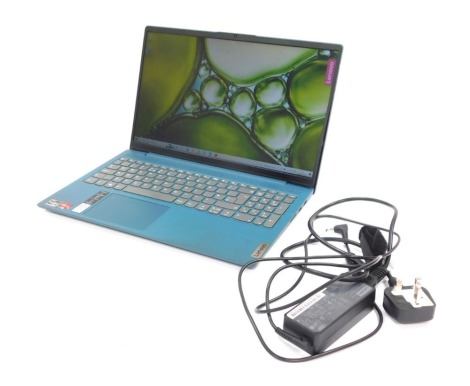 A Lenovo Ideapad 5 laptop, manufactured in 2020, in turquoise, with charger. (AF)