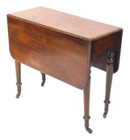 A Victorian mahogany drop leaf table, the table with rounded corners on tapered legs, terminating in castors, 71cm high, 81cm wide, 35cm deep, when closed.